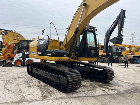 Gebruikte graafmachine CAT 323DL voor de bouw